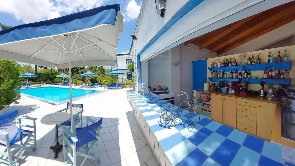 Blue white apartments pool bar view